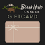 Black Hills Candle gift card design with a mountain and bison illustration on a black background.